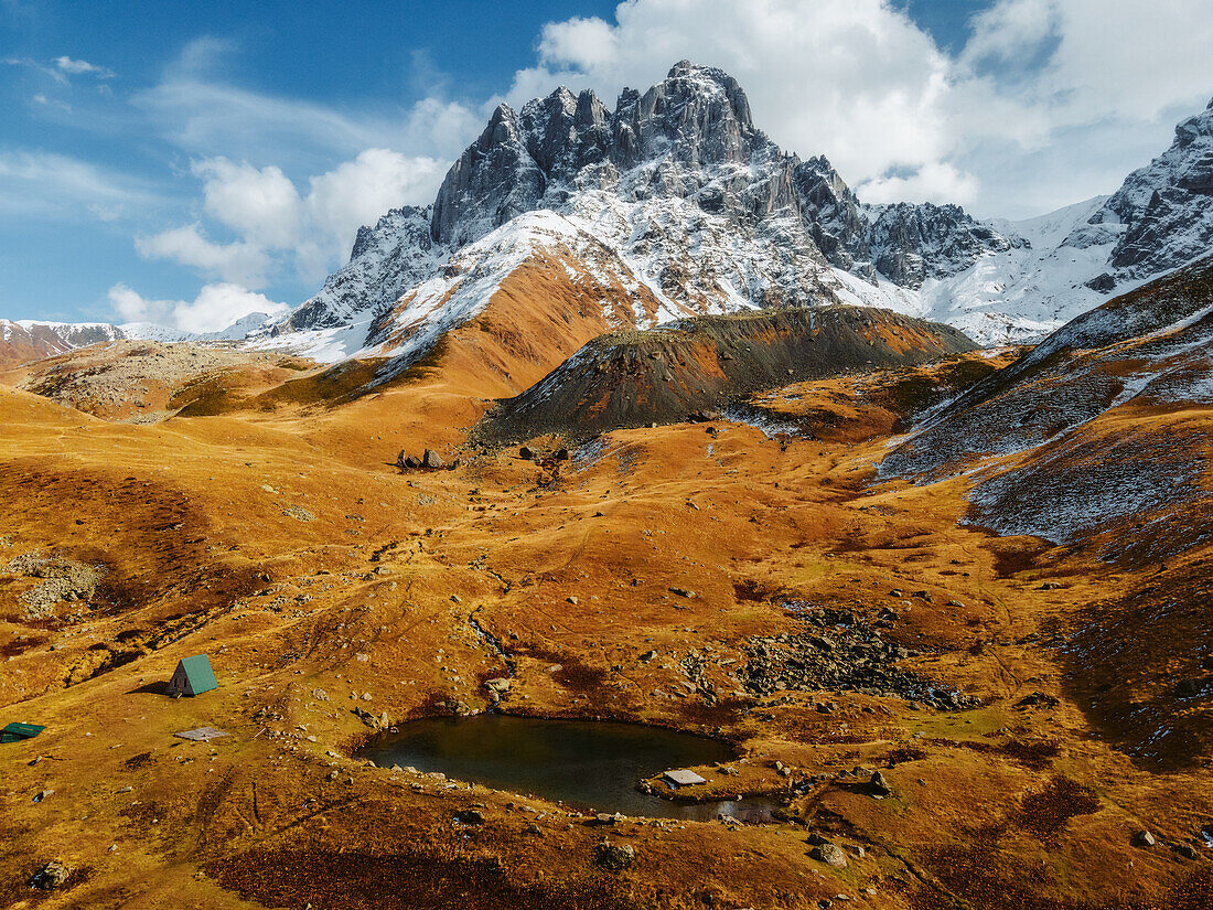 Aerial view of Chaukhi Lake and Mount Chaukhi, Juta Valley, Kazbegi, Georgia (Sakartvelo), Central Asia, Asia