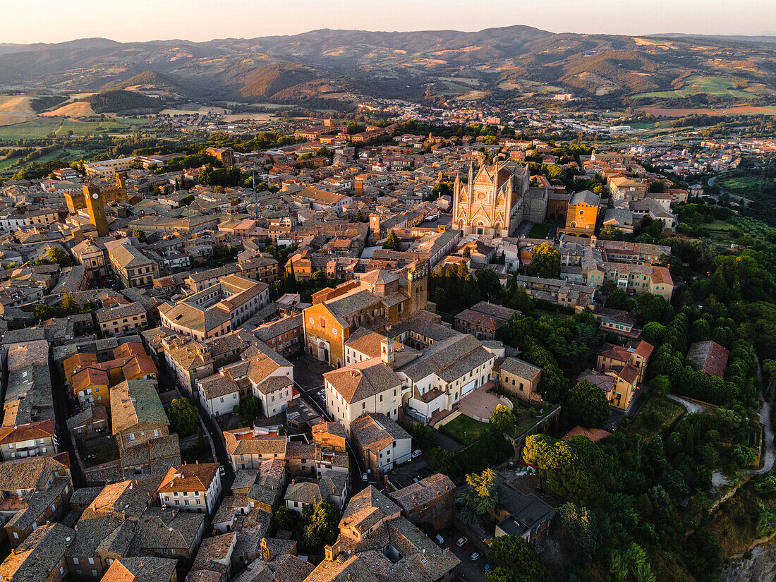 Drone view of Orvieto's Old Town cityscape at sunset, Orvieto, Umbria, Italy, Europe