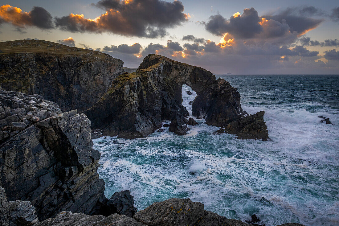 Stac a Phris Natural Sea Arch at sunset, near Shawbost, Isle of Lewis, Outer Hebrides, Scotland, United Kingdom, Europe