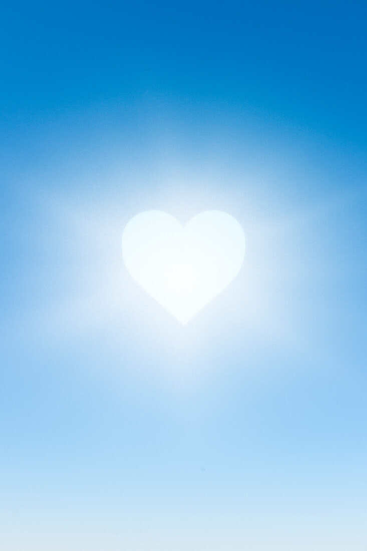 White heart against blue sky