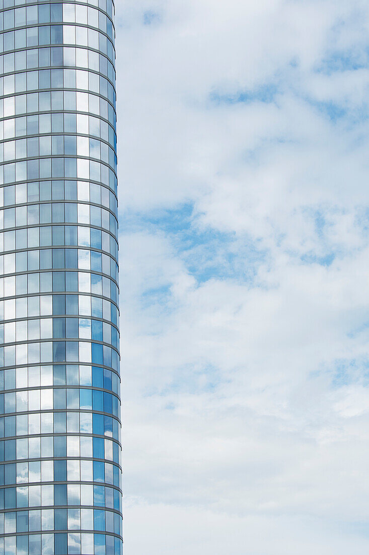 USA, Tennessee, Tall modern building exterior and cloud covered sky