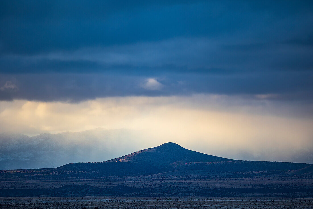 STORMY SKIES  OVER THE CERRILLOS FROM EL DORADO, NM, USA