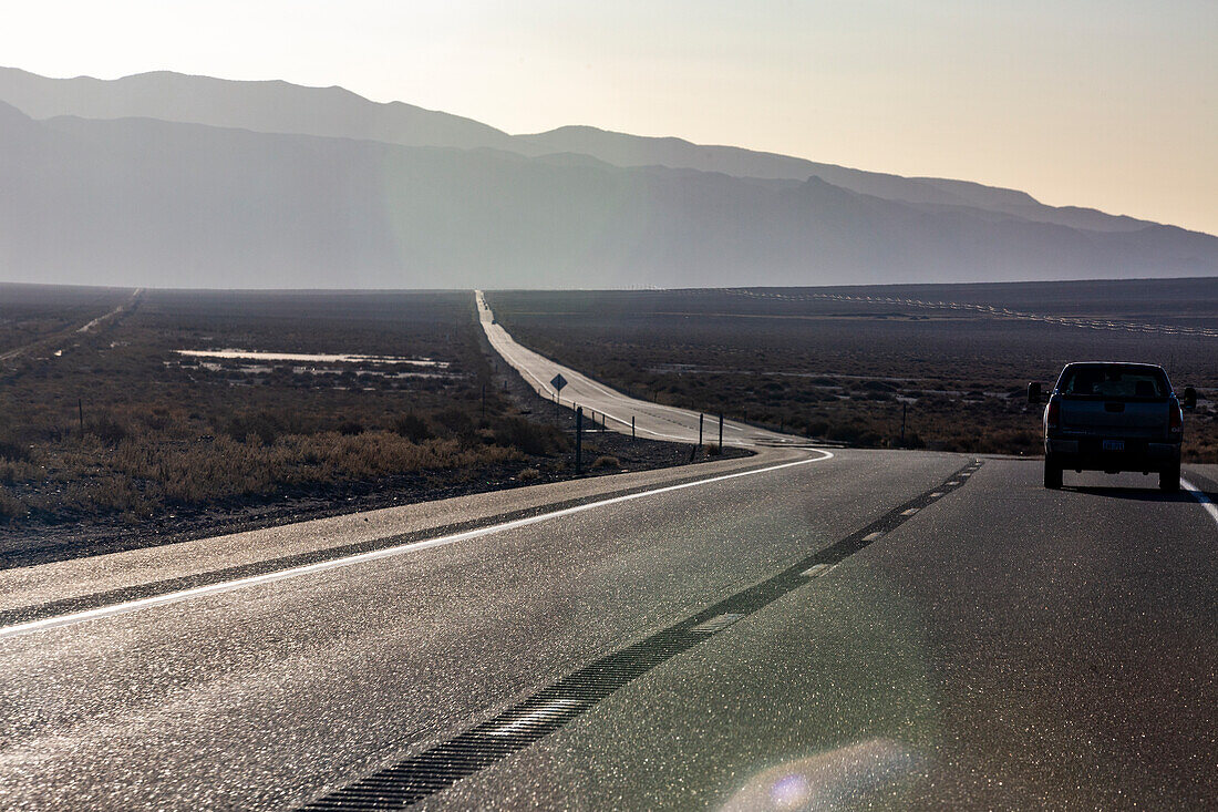 USA, Nevada, Hawthorne, Highway crossing desert landscape