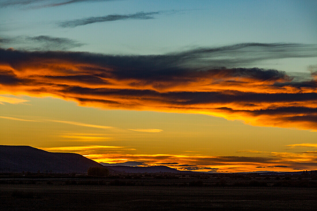 USA, Idaho, Bellevue, Hills and clouds at sunset