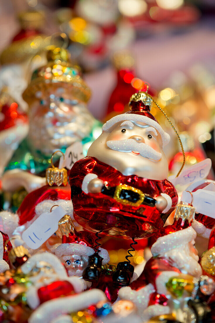 Switzerland, Basel. Basel Winter Holiday Market (aka Basler Weihnacht) at Barfusserplatz. Typical glass Christmas ornaments for sale at winter market.