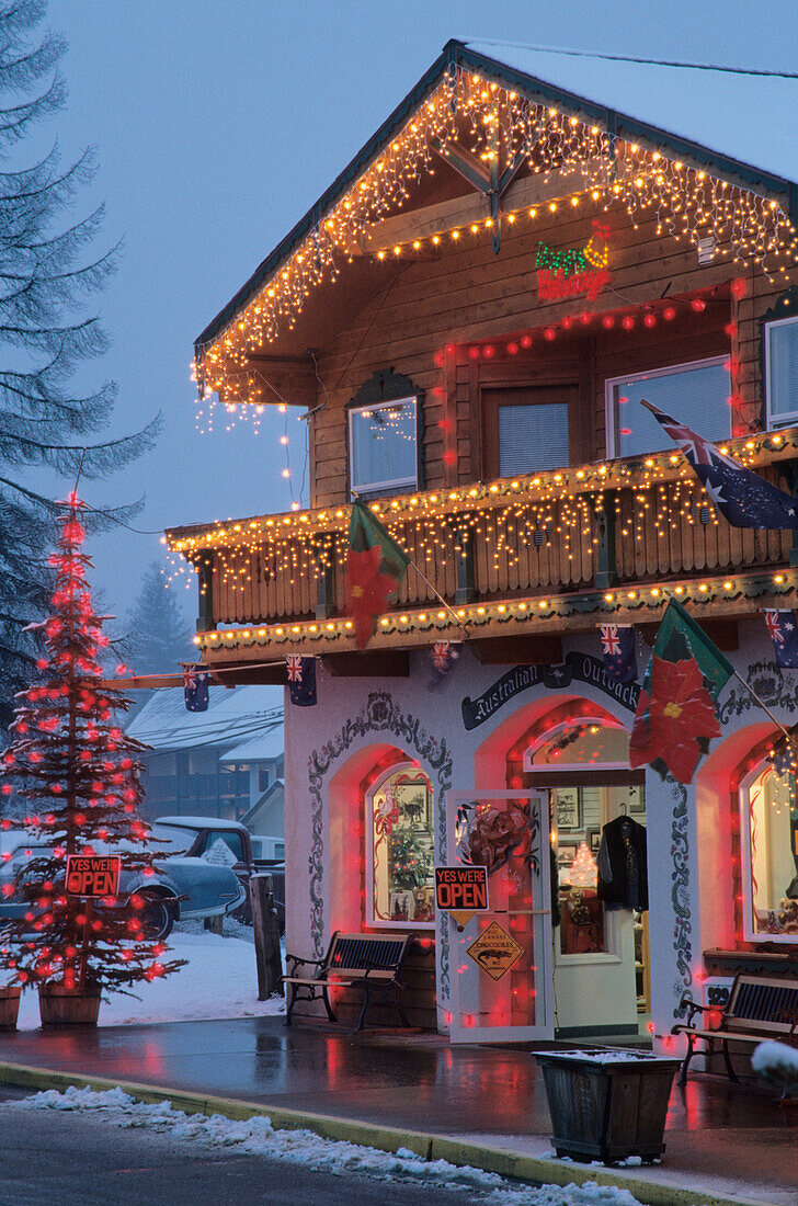 USA, Washington, Leavenworth. Christmas lights add festive air to Front Street at dusk (Editorial Usage Only)