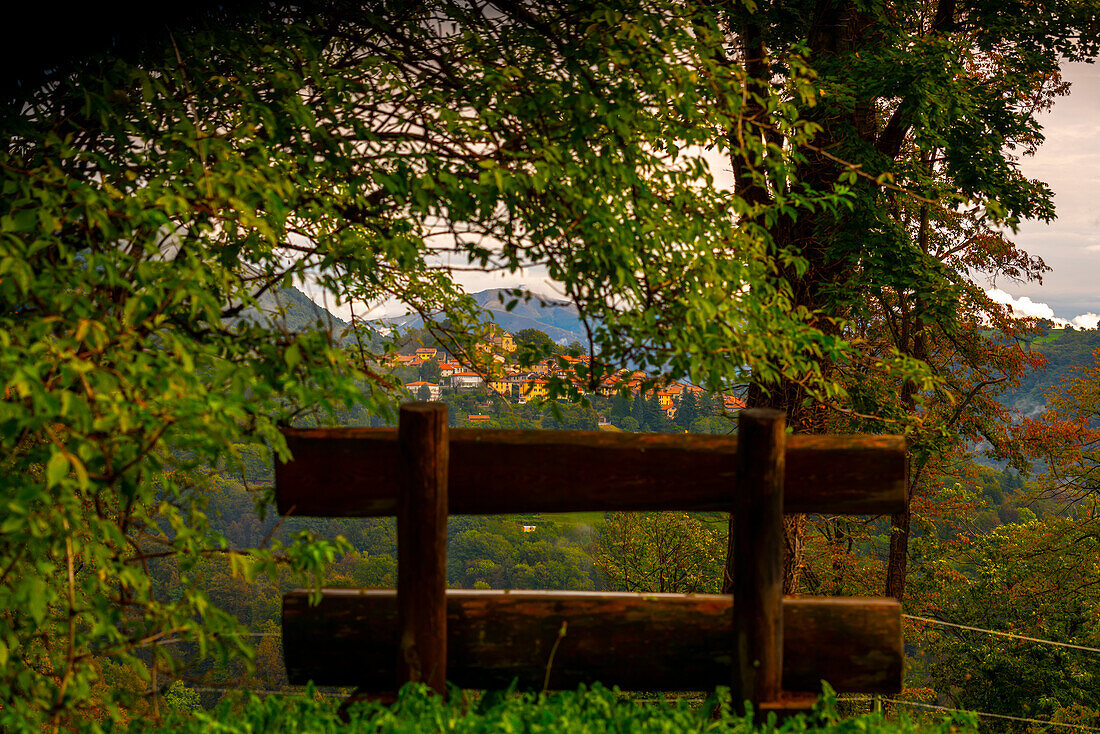 Bench with View over Alpine Village Breno with Mountain View in Ticino, Switzerland.