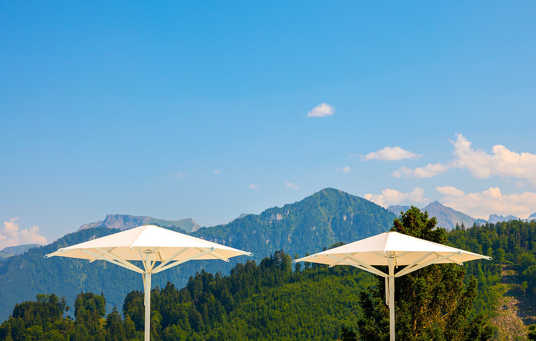 Two Parasol with Mountain View in Burgenstock, Nidwalden, Switzerland.