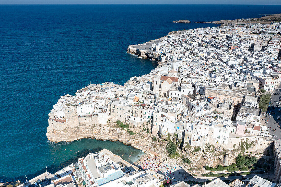 Aerial view of the sea town Polignano a Mare perched on cliffs, province of Bari, Apulia, Italy, Europe