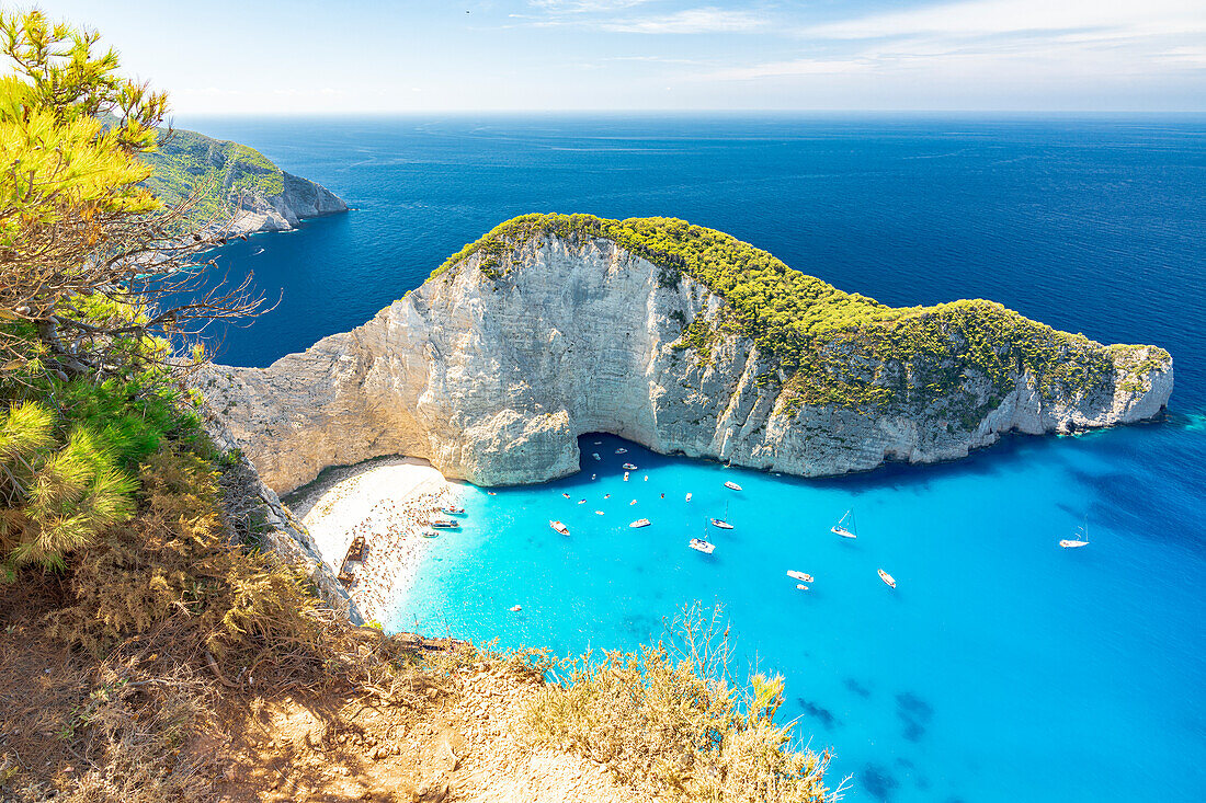 Turquoise sea washing the white sand of Navagio Beach (Shipwreck Beach) view from clifftop, Zakynthos island, Greek Islands, Greece, Europe