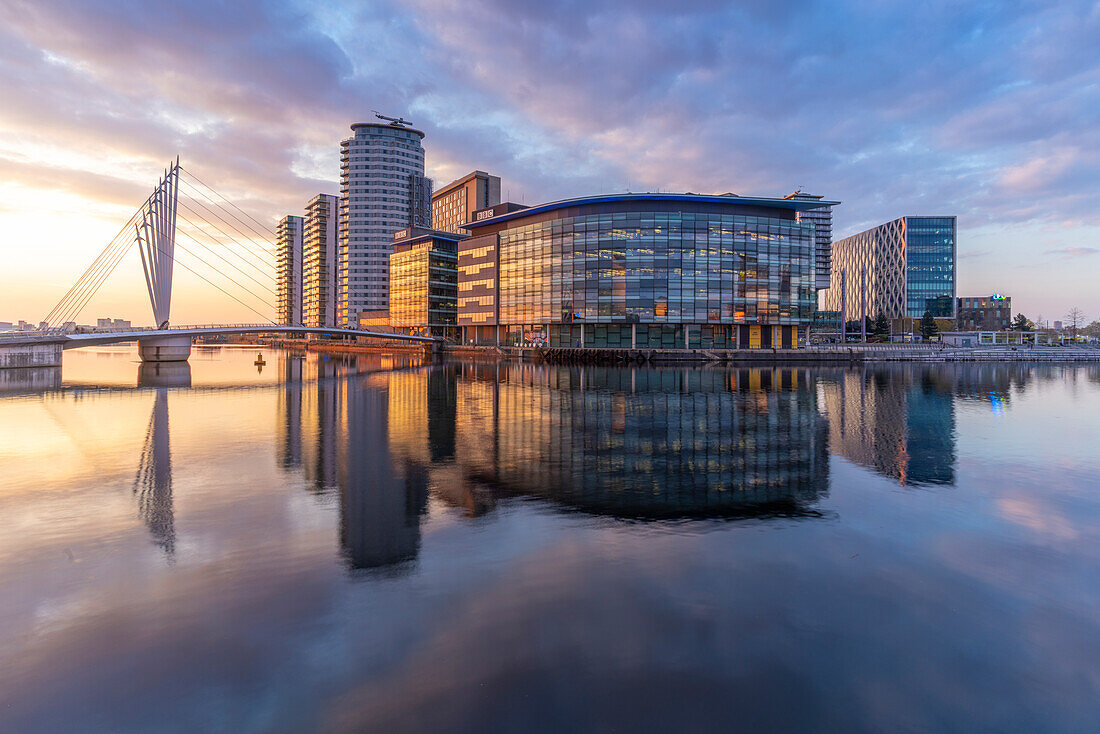 View of pedestrian bridge and MediaCity UK, Salford Quays, Manchester, England, United Kingdom, Europe