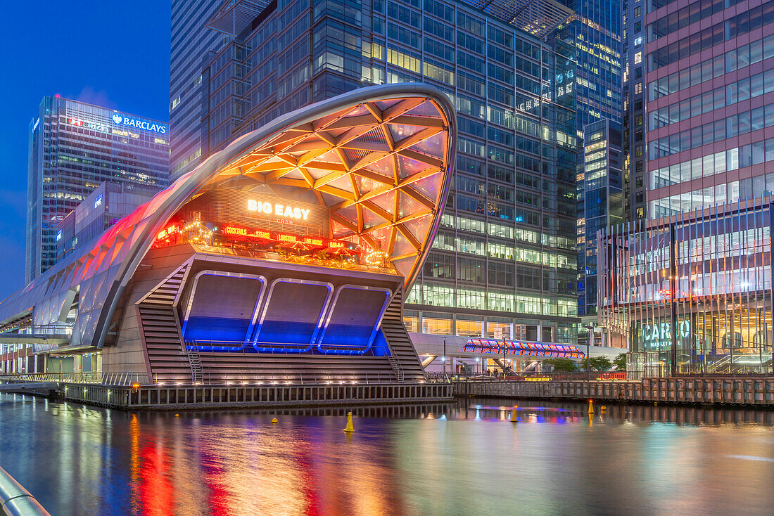 View of the Crossrail Station in Canary Wharf and tall buildings at dusk, Docklands, London, England, United Kingdom, Europe