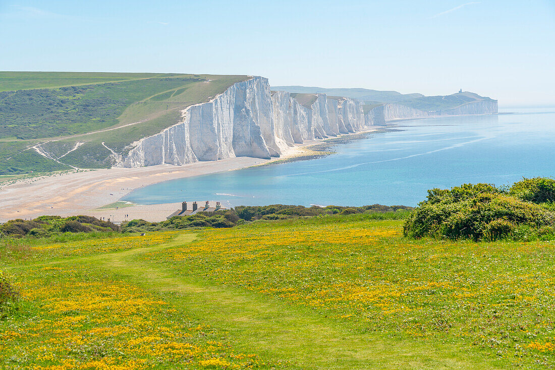 View of Seven Sisters Chalk Cliffs and Coastguard Cottages at Cuckmere Haven, South Downs National Park, East Sussex, England, United Kingdom, Europe