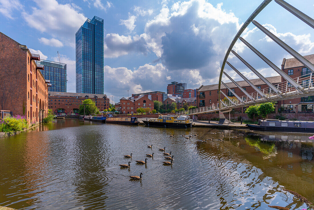 View of canal boats and contemporary skyline from Castlefield, Castlefield Canal, Manchester, England, United Kingdom, Europe
