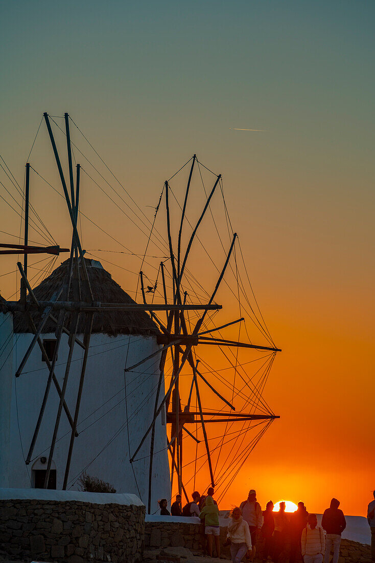 View of windmills at sunset, Mykonos Town, Mykonos, Cyclades Islands, Greek Islands, Aegean Sea, Greece, Europe
