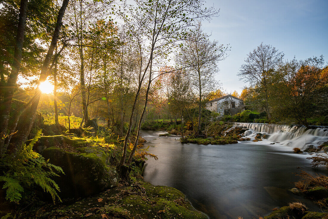 Mondim de Basto waterfall with a mill house at sunset, Norte, Portugal, Europe