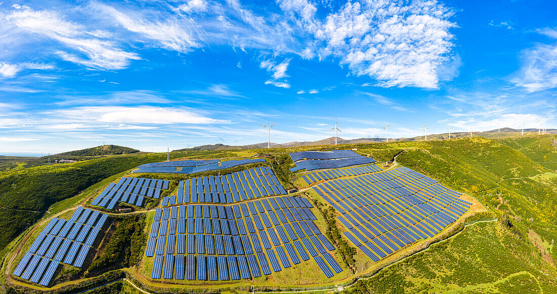 Solar panels and wind turbines on the green plateau, Encumeada, Madeira island, Portugal, Atlantic, Europe