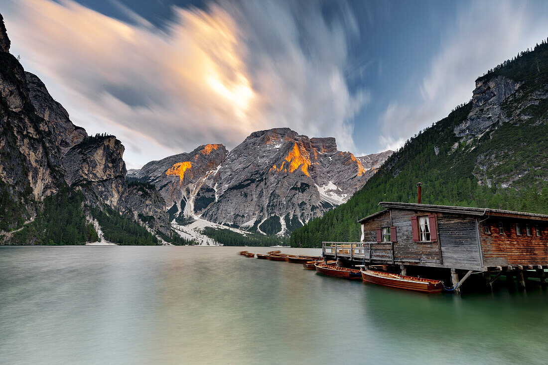 Cloudy sky at sunset over Croda del Becco and Lake Braies (Pragser Wildsee), Dolomites, South Tyrol, Italy, Europe