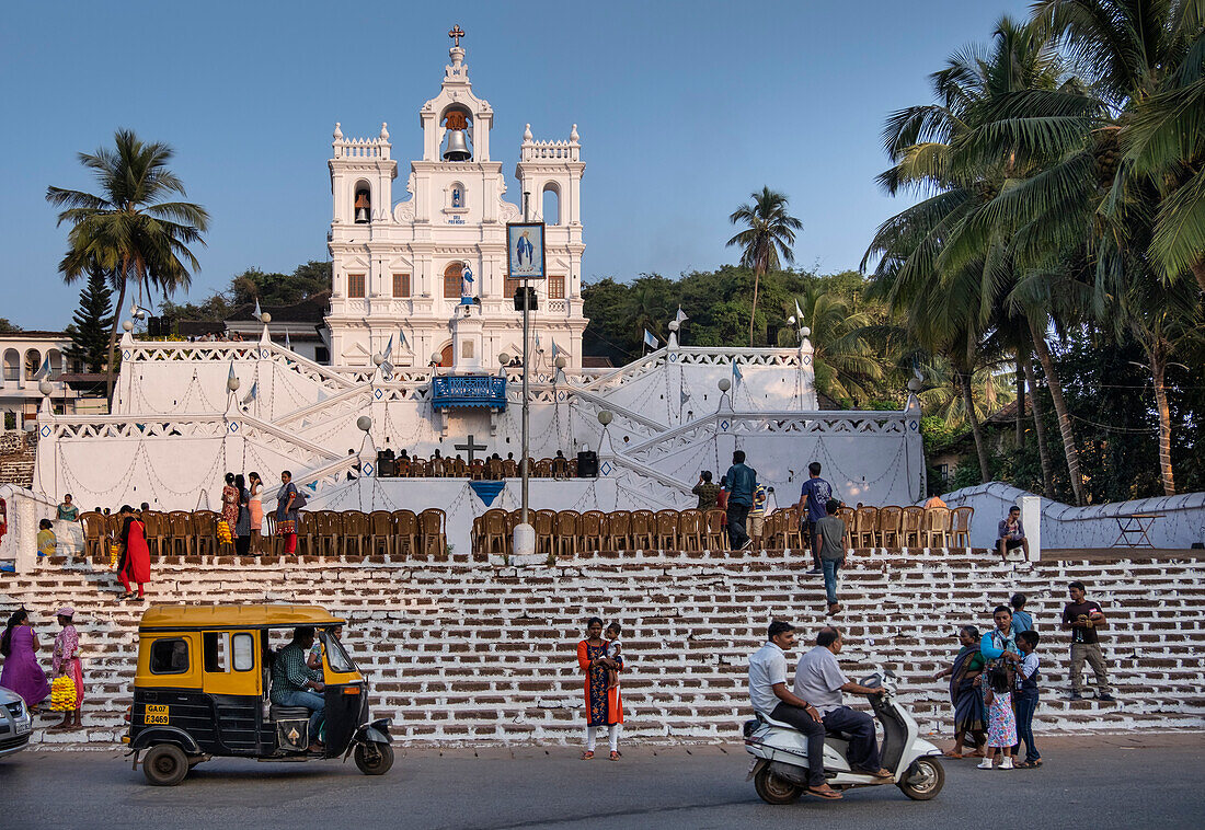 A Tuk Tuk outside The Church of Our Lady of the Immaculate Conception, UNESCO World Heritage Site, Panjim (Panaji), Goa, India, Asia