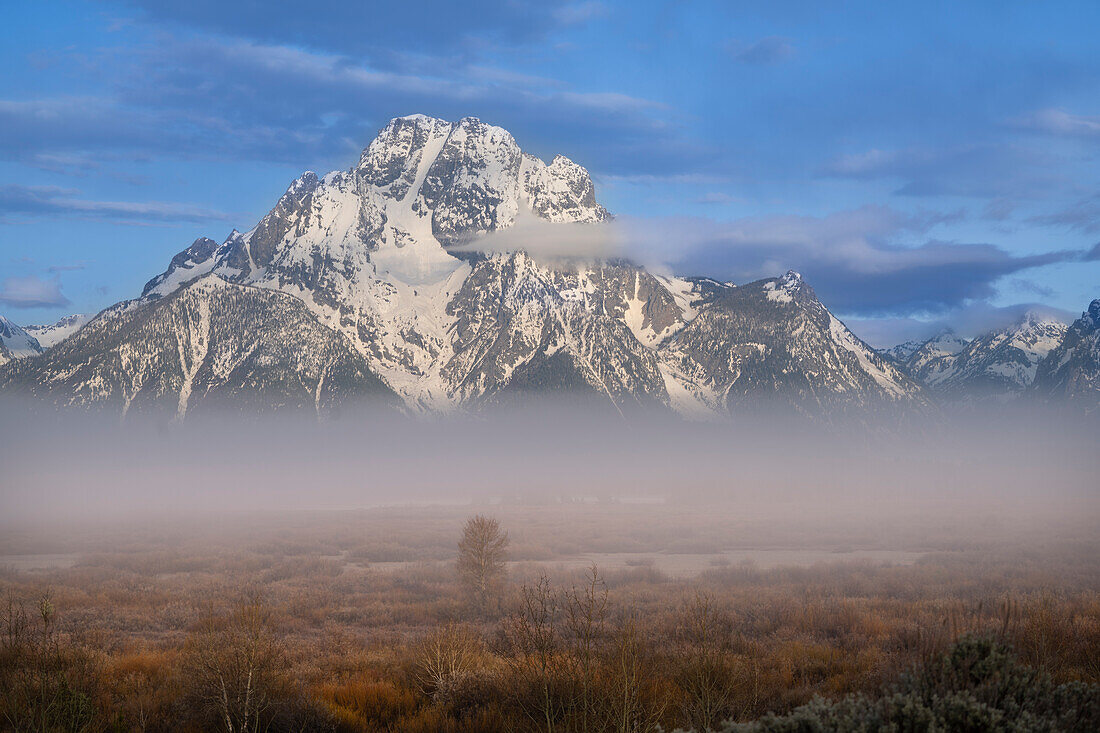 USA, Wyoming, Grand Teton National Park. Sunrise on cloudy Teton Range.