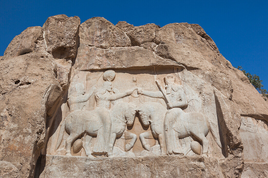 Iran, Central Iran, Shiraz, Naqsh-e Rostam, Sassanian stone reliefs cut into mountain