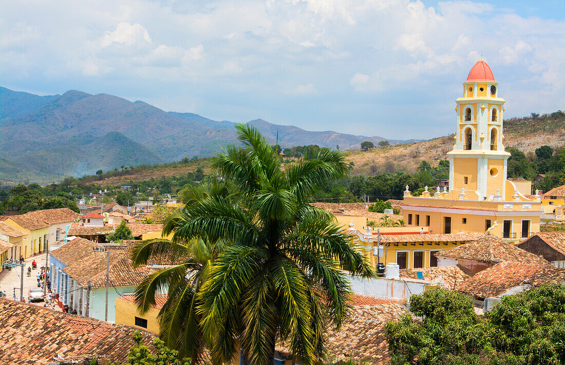 Trinidad Cuba from above tower with church and mountains with buildings of tile roofs of second oldest Colonial city