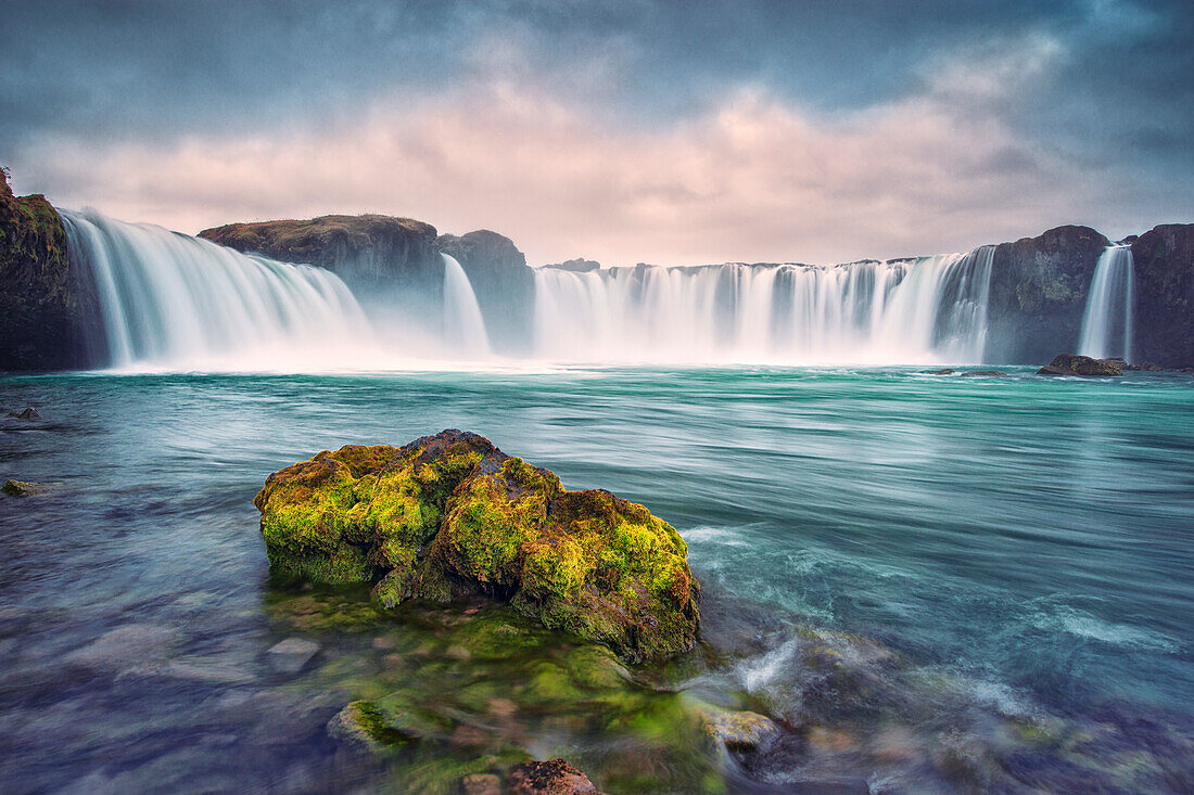 Iceland, Godafoss. Waterfall at sunrise.