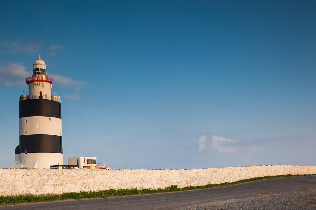 Ireland, County Wexford, Hook Peninsula, Hook Head, Hook Head LIghthouse, sunset