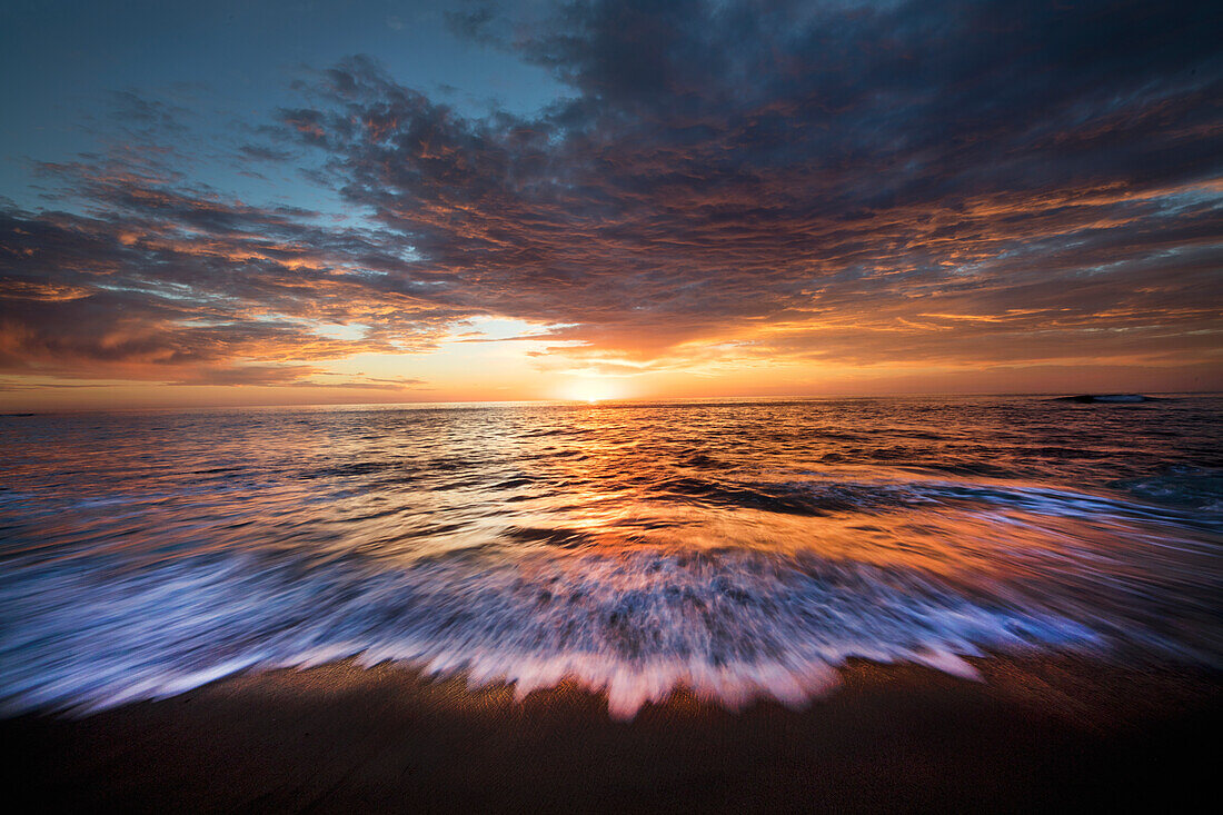 USA, California, La Jolla. Sunset over beach.