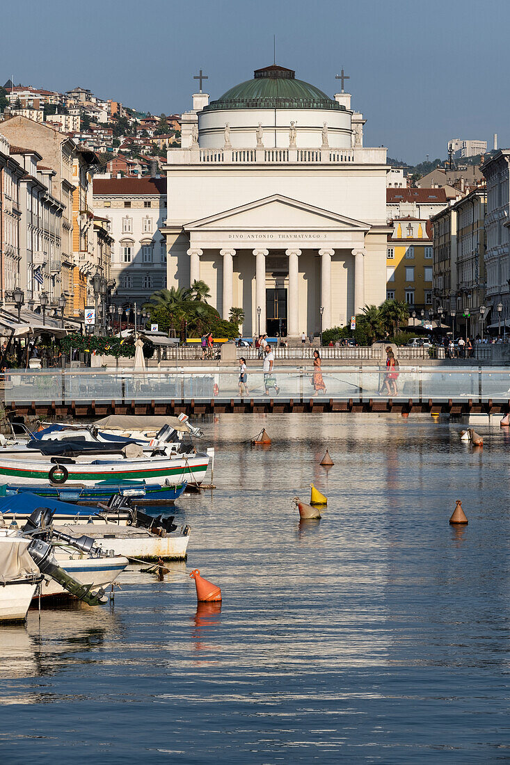 Boats on the Grand Canal and St. Anthony's Church, Trieste, Friuli-Venezia Giulia, Northern Italy, Italy, Europe