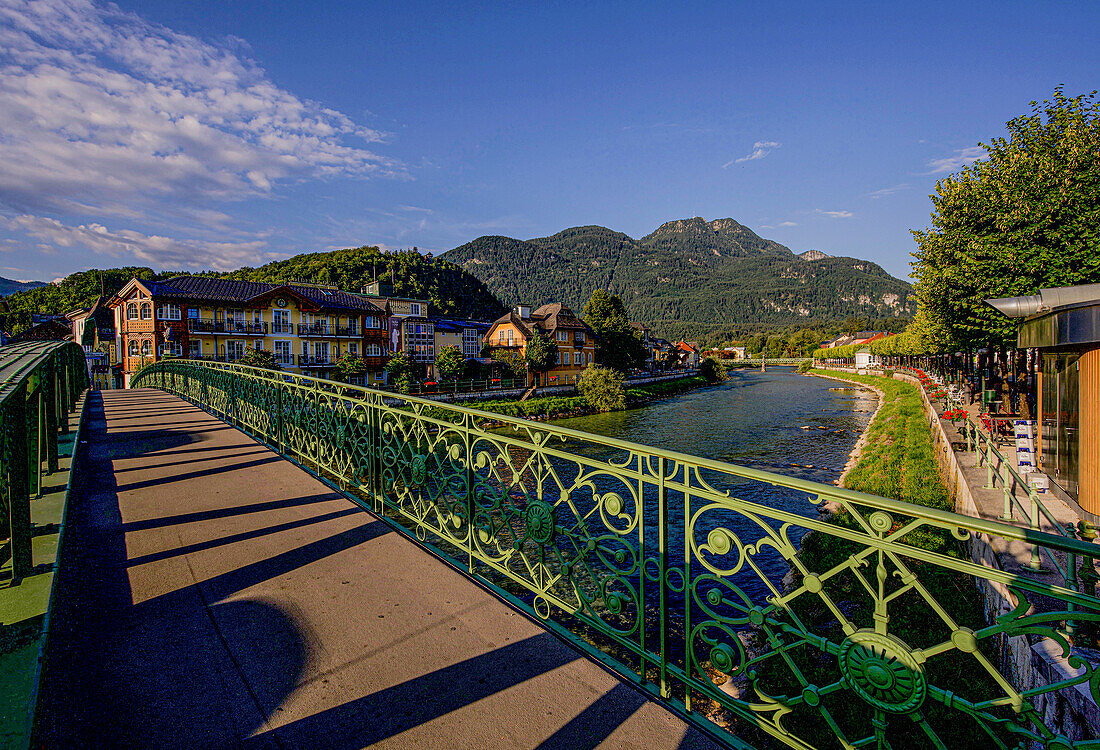 Waterfront promenade and mountains seen from the bridge over the Traun, Bad Ischl, Upper Austria, Austria