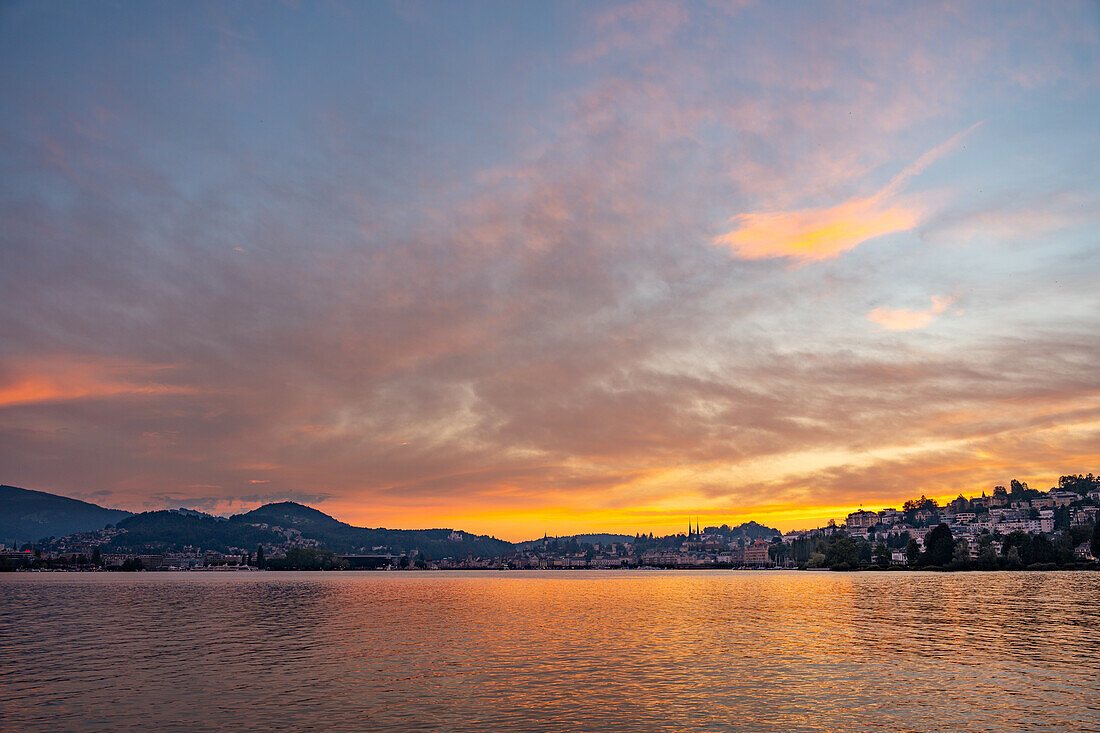 View over Lake Lucerne to Lucerne with red sky