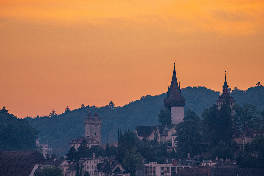 Historical towers of the Lucerne city wall with sky blush