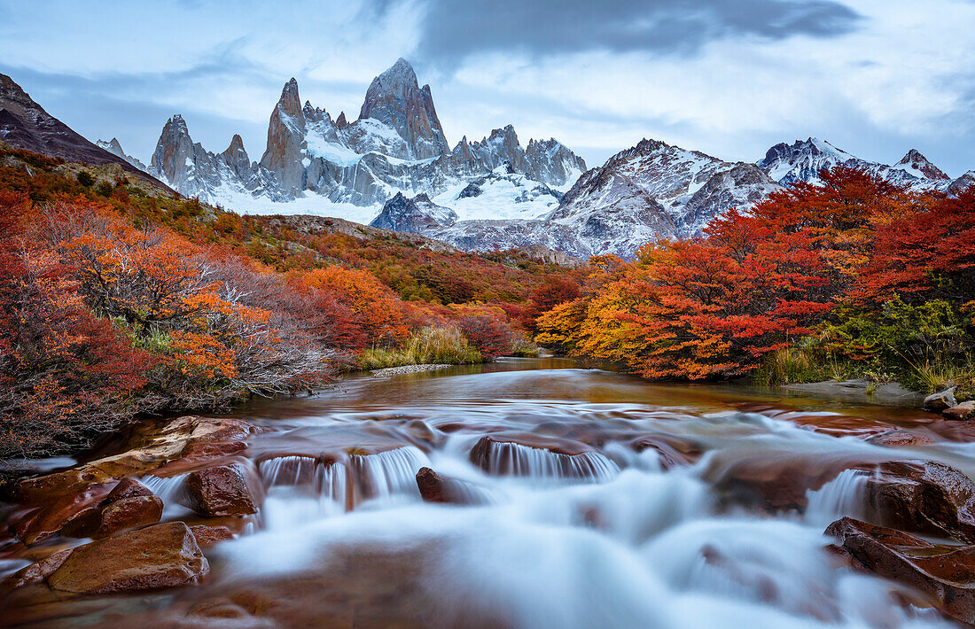 Argentina, Los Glaciares National Park. Mt. Fitz Roy and Lenga beech trees in fall.
