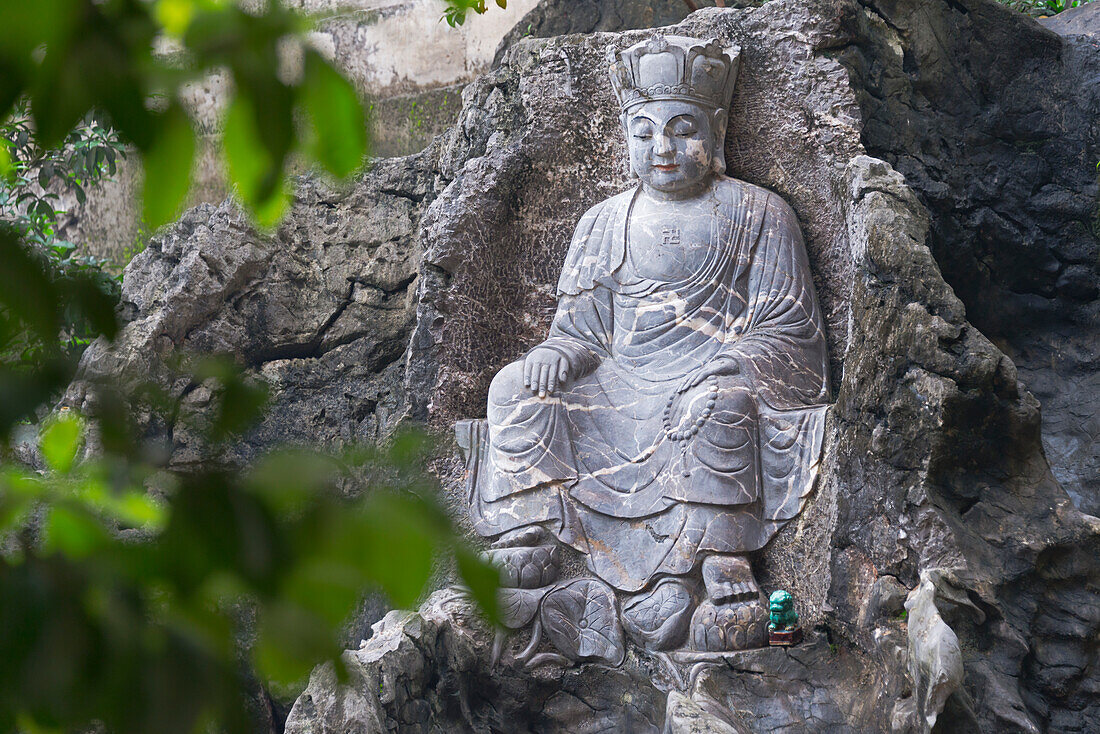 Buddhist statue in Xizhu Temple, Sanmenyan Scenic Area, Yizhou, Guangxi Province, China