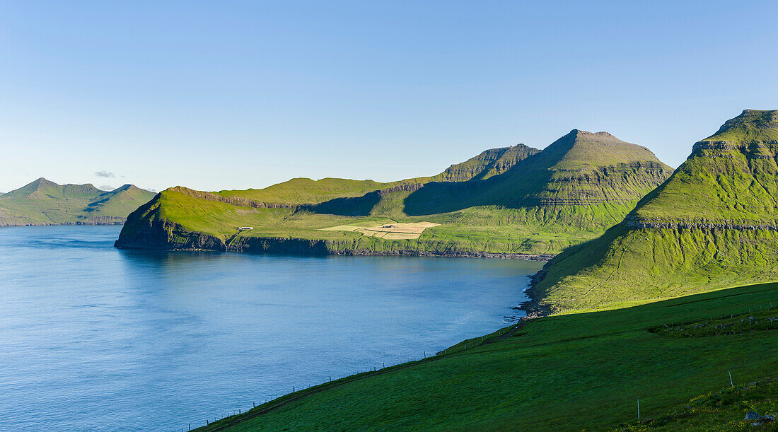 The mountains and cliffs of the west coast. Denmark, Faroe Islands