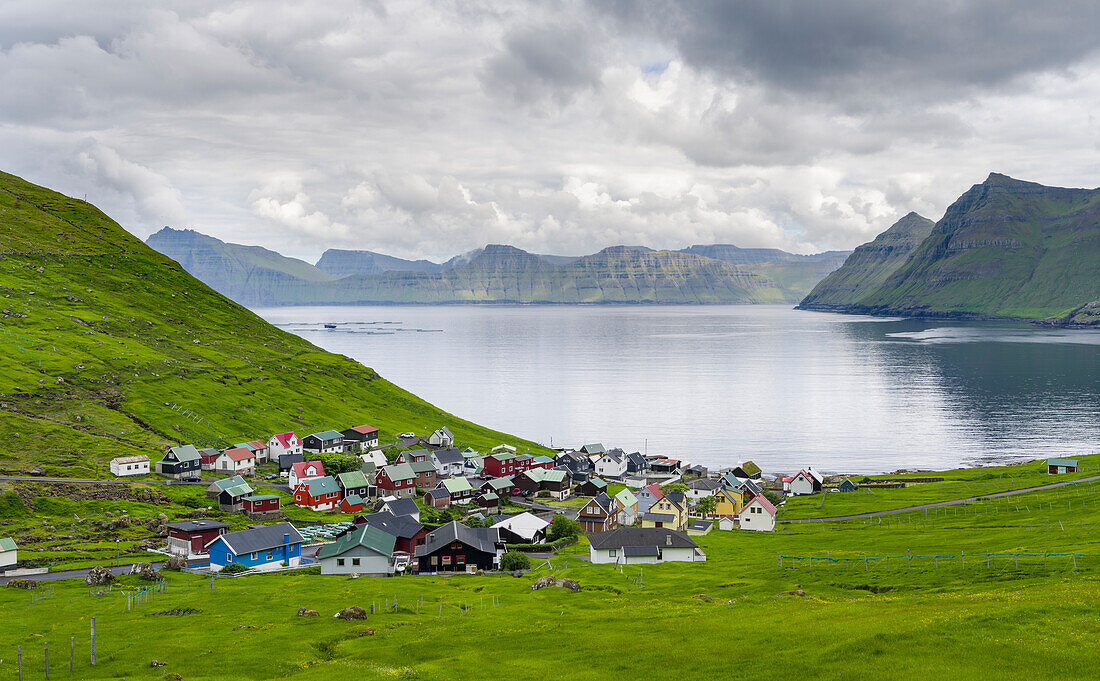 Village of Funningur, in the background Funningsfjordur, Leiriksfjordur and the island Kalsoy. Northern Europe, Denmark