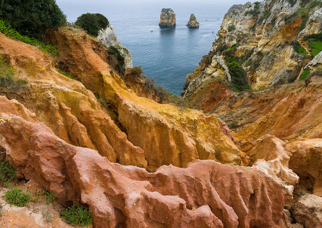 The cliffs and sea stacks of Ponta da Piedade at the rocky coast of the Algarve in Portugal.