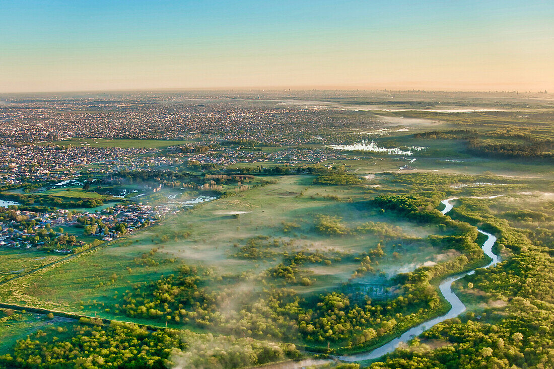 Landing path to Ezeiza EZE Buenos Aires International Airport. The city of Buenos Aires on the distant horizon.