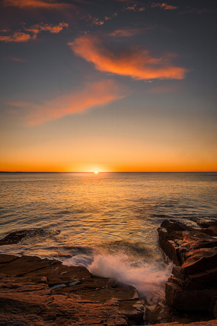 USA, Maine, Acadia National Park. Sunset on ocean coastline.