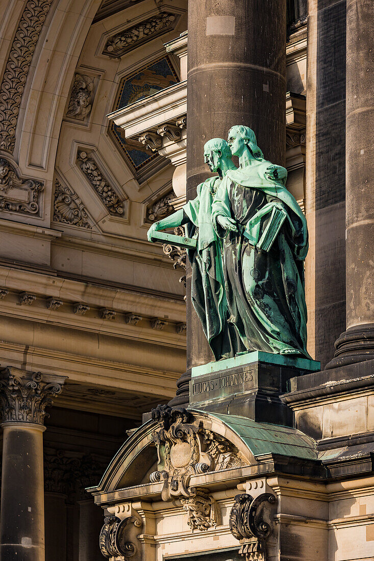 Statues of Luke and John as evangelists at Berlin Cathedral, Germany