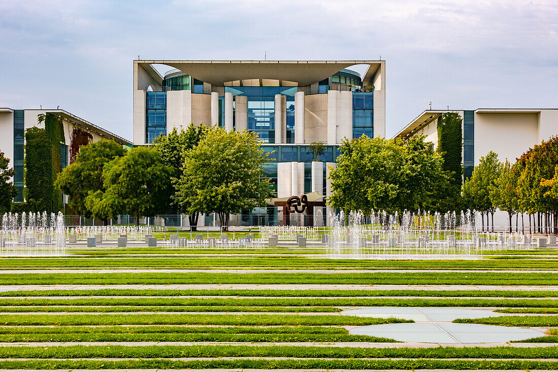 Chancellery in Berlin with meadow and water features, Berlin, Germany