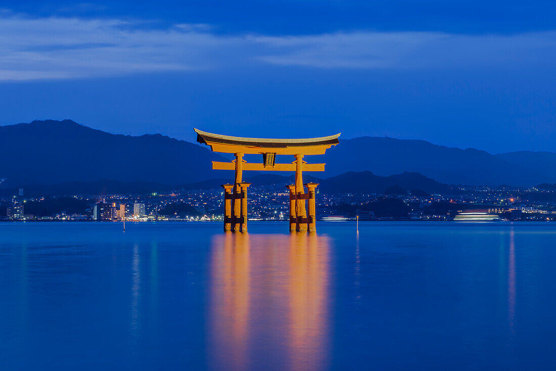 Japan, Miyajima, Itsukushima Shrine, Twilight Floating Torii Gate