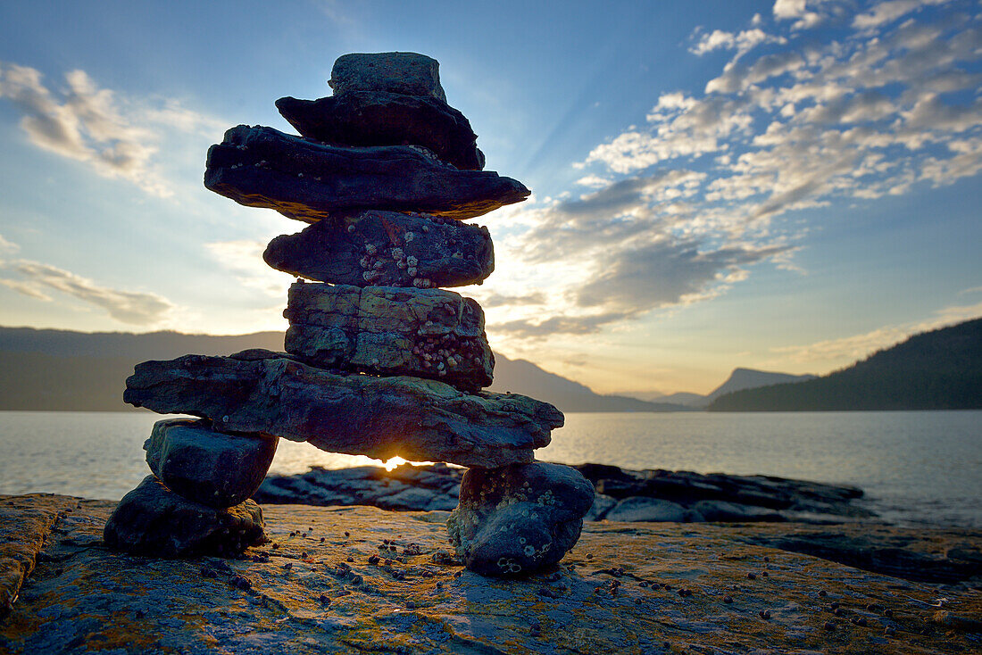 Canada, British Columbia, Russell Island. Rock Inukshuk in front of Salt Spring Island.