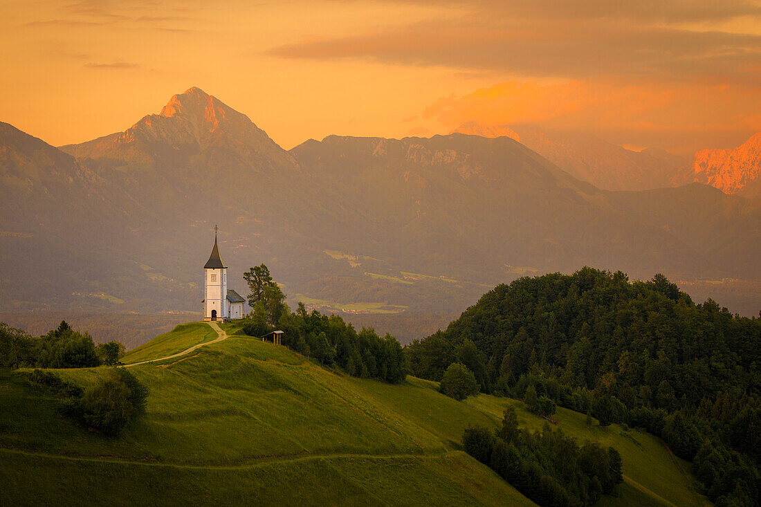 Europe, Slovenia. Chapel of St. Primoz at sunset