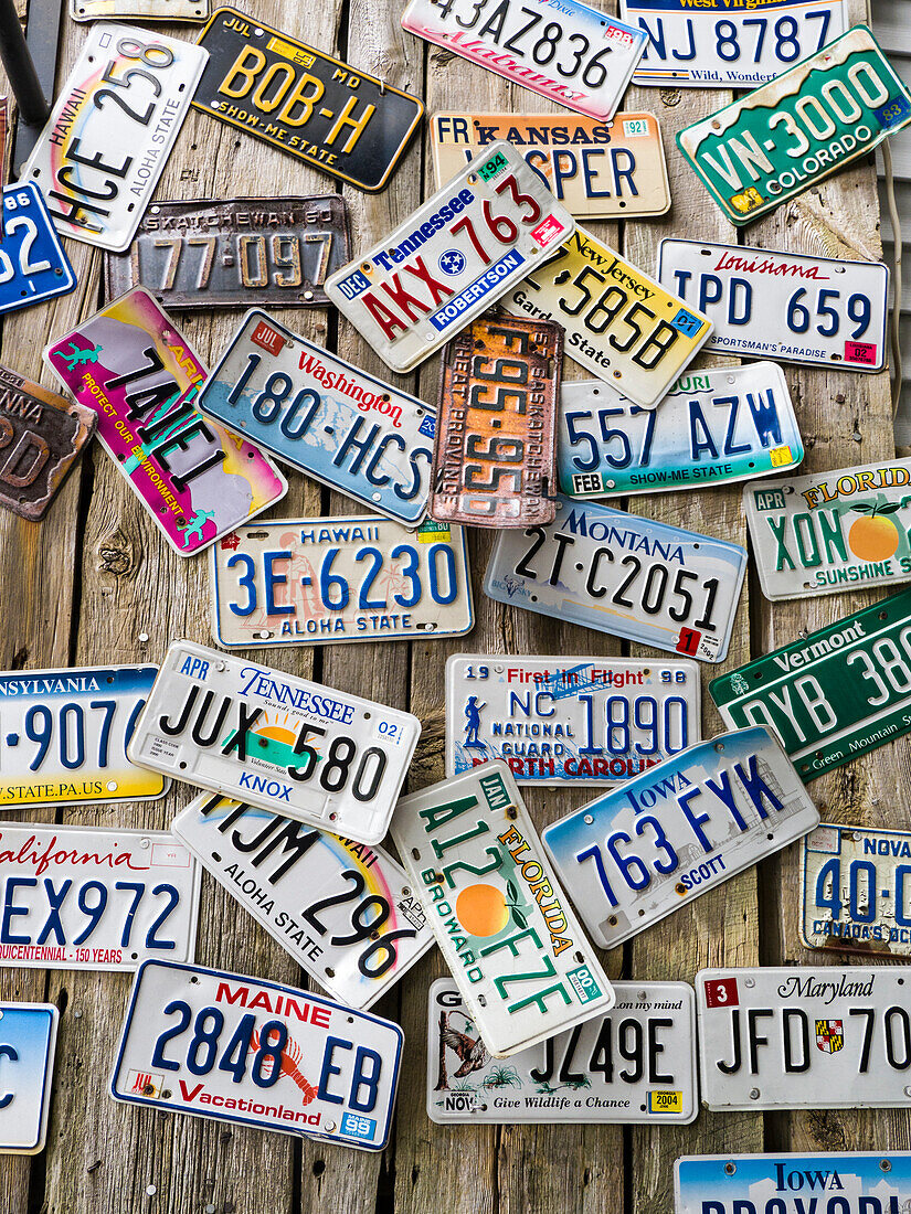 USA, Maine. License plates on Old Wall in Bar Harbor.