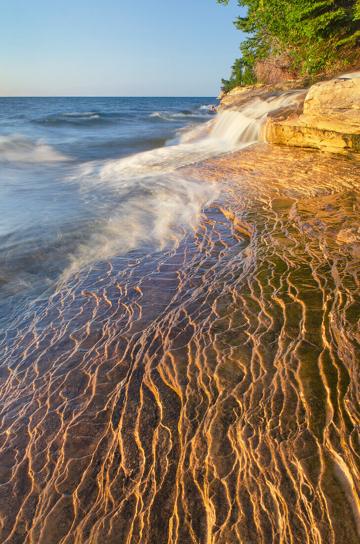 Elliot Falls flowing over layers of Au Train Formation sandstone at Miners Beach. Pictured Rocks National Lakeshore, Michigan