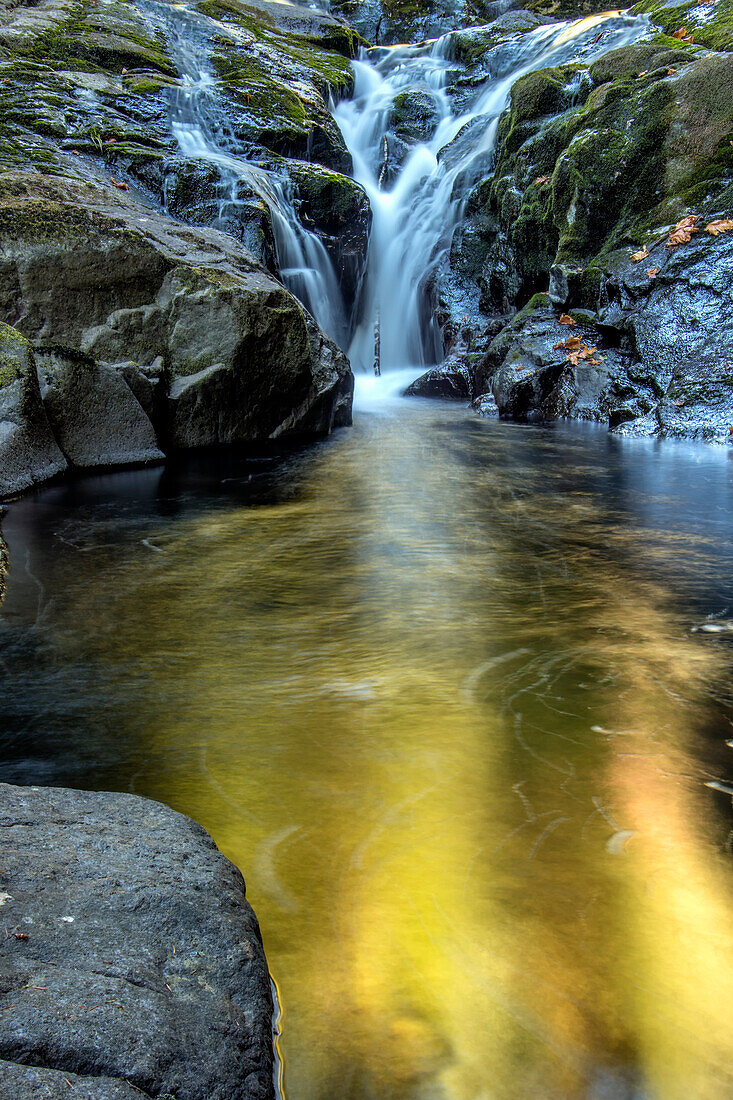 USA, Oregon, Florence. Waterfall in stream