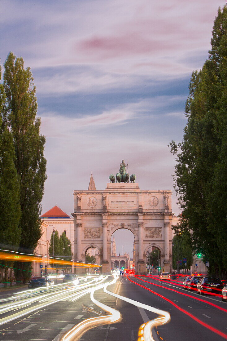 View along Leopoldstrasse to the Siegestor, Schwabing, Munich, Upper Bavaria, Bavaria, Germany