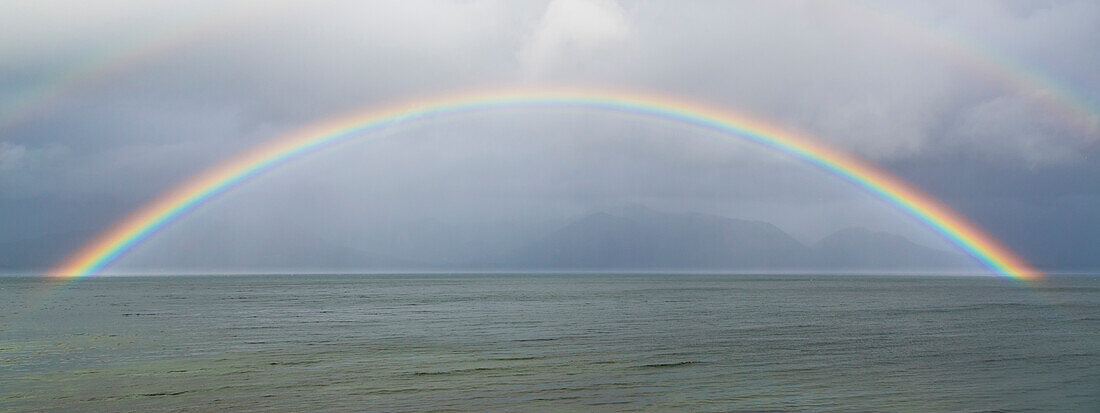 USA, Washington, Seabeck. Rainbow over Hood Canal.